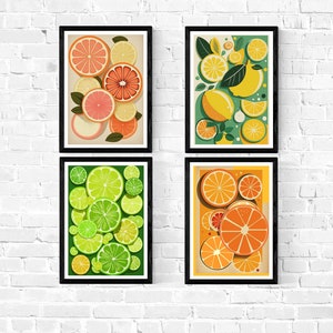 May include: Four framed prints featuring colorful illustrations of citrus fruit slices, including lemons, limes, oranges, and grapefruits. The prints are arranged in a grid pattern on a white brick wall.
