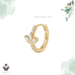 14 kt gouden diamanten lotusoorring: marquise en ronde moissaniet