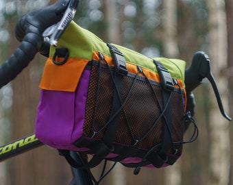Ensemble de sacoches de vélo colorées : sacoche de guidon étanche avec boucles magnétiques en orange, violet et vert clair