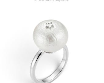 Freshwater cultured mabé pearl ring with a central zirconia star