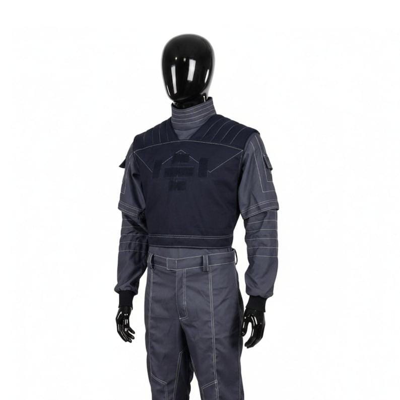 May include: A dark gray uniform set consisting of a long-sleeved shirt with a high collar, a dark navy blue tactical-style vest with white contrast stitching, and matching dark gray trousers featuring prominent white seam detailing throughout.