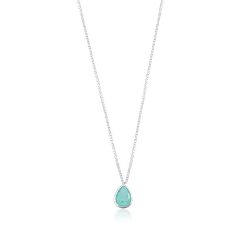 May include: A silver chain necklace with a teardrop-shaped pendant featuring a light blue gemstone.
