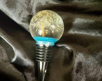 Tapón de botella con forma de diente de león