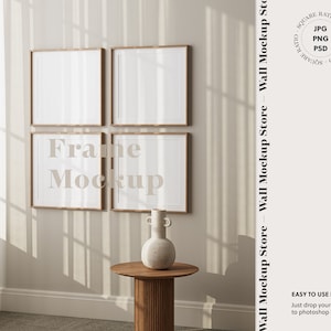 May include: Three square picture frames with a light wood frame and white mount. The frames are hanging on a light beige wall with a small table and a decorative vase in front of them. The frames are empty and ready for your photos.