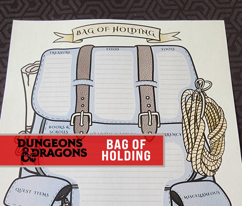 May include: A light blue "Bag of Holding" themed organizer with brown straps and a rope. The organizer has sections labelled "Treasure", "Food", "Tools", "Books & Scrolls", "Currency", "Quest Items", and "Miscellaneous". The Dungeons & Dragons logo is also visible.