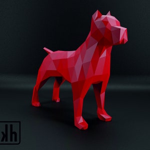 May include: A red geometric dog sculpture with a polygonal design. The dog is standing on all fours, with its tail up and ears perked. The sculpture is set against a dark background.