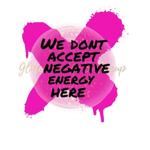 May include: Pink and gold glitter background with the text "We don't accept negative energy here" in black.