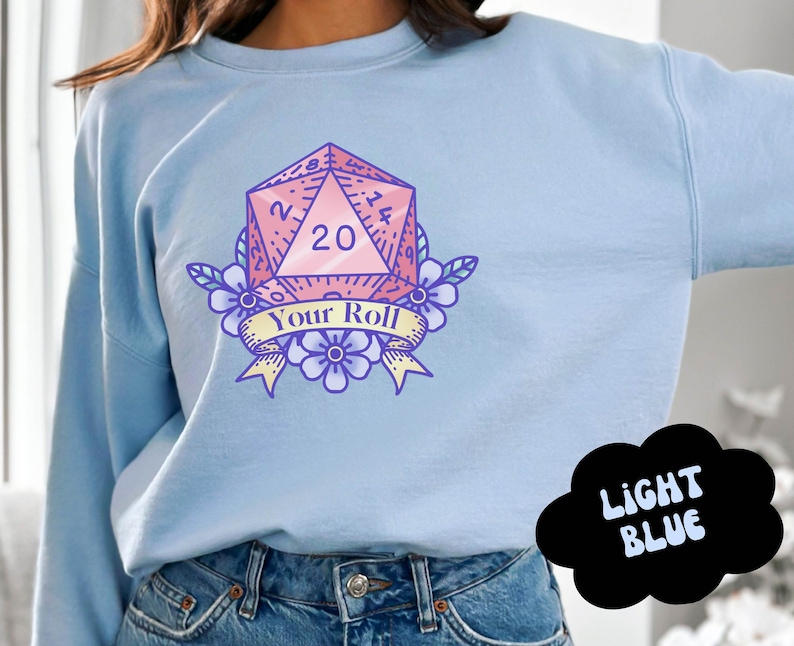 Cute and cozy sweater with D20 Game Dice in pastel colors, sweater color is light blue