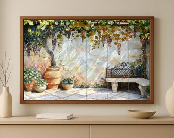 May include: A framed artwork depicting a Tuscan scene with a grape vine, pots of plants, and a stone bench. The artwork features a warm color palette with shades of brown, green, and purple. The image is framed in a dark wood.
