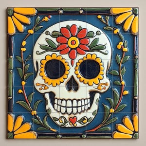 May include: Square ceramic tile featuring a Day of the Dead sugar skull design. The skull is white with black eye sockets and a wide grin. It is decorated with a red flower, yellow sunflowers, and green leaves against a blue background.