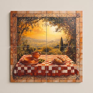 May include: A painting of a Tuscan landscape. A red and white chequered tablecloth is set with a bowl, plate, olives, and croissants. The scene is framed by a decorative border and a view of rolling hills and a sunset.