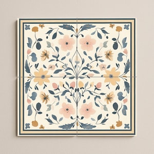 May include: Four square tiles arranged to form a larger square, featuring a floral design. The design includes pink and yellow flowers, blue leaves, and a cream-coloured background. A dark blue border frames the design, with a thin beige line inside.
