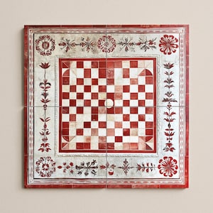 May include: A decorative chess board with a red and white checkered pattern. The board is framed with a red and white floral design. The board is made of four square tiles.