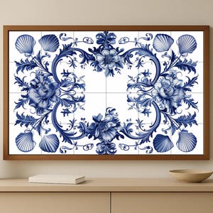 May include: A framed wall art piece featuring a blue and white floral and seashell design. The artwork is composed of multiple square tiles, creating a cohesive pattern. The frame is a warm brown color, and the overall aesthetic is reminiscent of classic decorative art.