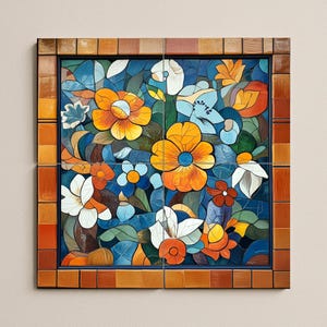May include: A floral mosaic artwork featuring vibrant orange, white, and blue flowers against a deep blue background. The artwork is framed with a border of brown and orange tiles, creating a decorative wall hanging.