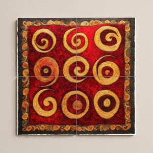 May include: Abstract artwork with a red backdrop and nine golden spiral patterns. The piece is framed with a dark brown border with decorative elements. The artwork is divided into four square panels.