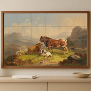 May include: A framed tile mural depicting a pastoral scene with a bull, cows, and a dog in a mountainous landscape. The artwork features a brown and white bull standing prominently, with other animals resting on a grassy area.