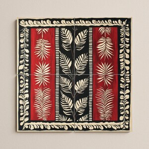 May include: A decorative square artwork featuring a repeating pattern of red and black vertical stripes with white leaf designs. The artwork is framed with a black and white border, creating a striking contrast.