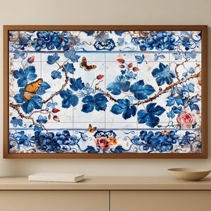 May include: A framed artwork featuring a detailed floral and butterfly design. The artwork showcases blue leaves, grapes, and butterflies against a white tile background, framed in a brown wooden frame. A pink rose adds a pop of color.