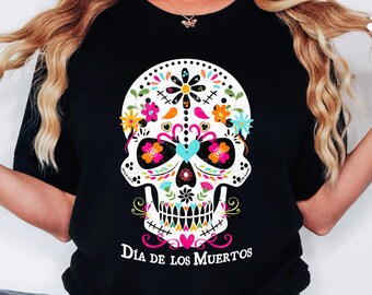 May include: Black t-shirt with a colorful sugar skull graphic and the text "Dia de los Muertos".
