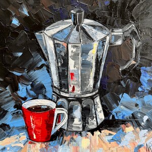 May include: A silver and black coffee pot with a red coffee cup on a blue and brown background.