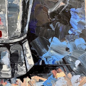 May include: A close-up of a painting of a glass carafe with a black handle. The carafe is on a table with a textured surface. The background is a dark blue and black abstract design.