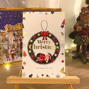 Carte de vœux, carte de noël avec dorures (lutin farceur)