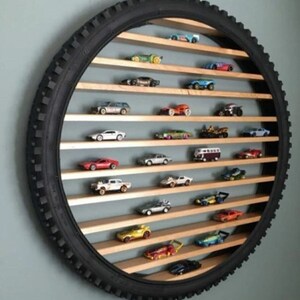 24-inch NEW.. Wheel-shaped shelf for cars and motorcycles