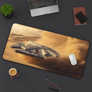 May include: A large, gray spaceship flies over a desert landscape with clouds in the background. The spaceship is flying low to the ground, kicking up sand and dust. The scene is reminiscent of a science fiction movie.