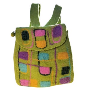 May include: A green felt backpack with a flap closure. The backpack has a geometric design with colorful squares and lines in shades of pink, purple, orange, blue, and black.