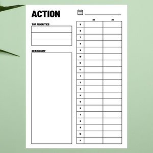 May include: A black and white printable planner page with the word "ACTION" in bold at the top. The page is divided into two sections: "TOP PRIORITIES" and "BRAIN DUMP". The "TOP PRIORITIES" section has three blank lines for writing. The "BRAIN DUMP" section is a large blank space for writing. The page also has a calendar icon and a numbered list of 20 items.