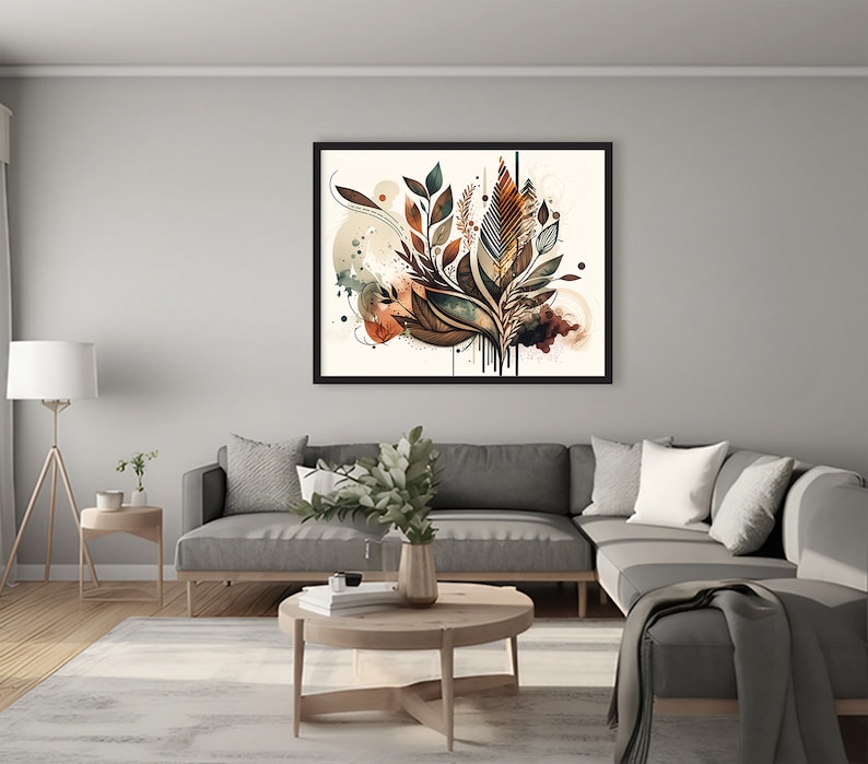 May include: A framed abstract art print with a watercolour style design featuring brown, green, and orange leaves on a white background.
