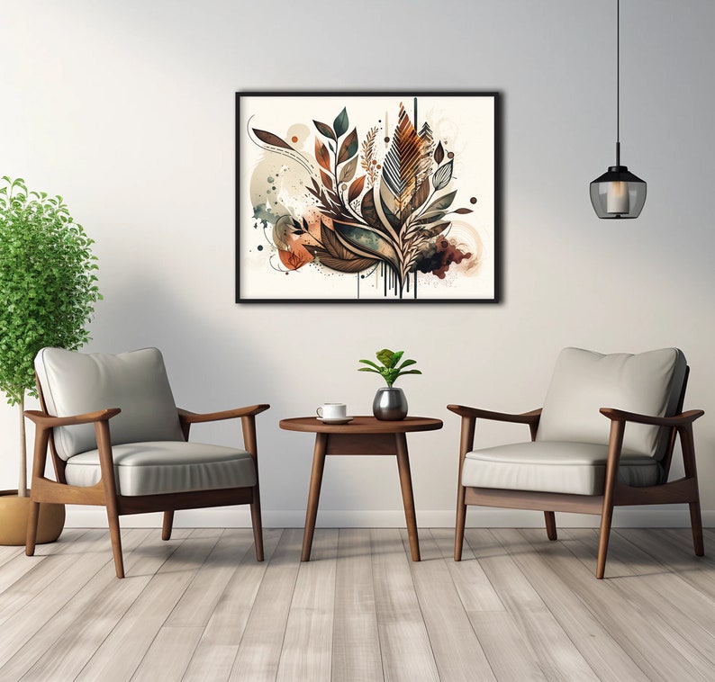 May include: A framed abstract art print featuring a brown, green and white floral design. The print is hanging on a white wall above a wooden coffee table with two chairs.