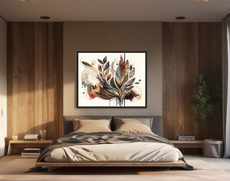 May include: A framed abstract art print with a watercolour style design featuring a cluster of stylised leaves in shades of brown, green, and blue. The leaves are arranged in a loose, organic pattern and appear to be dripping with paint. The background is a light beige with hints of orange and brown.