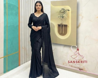 Sari negro de diseñador, de seda natural, ideal para fiestas y bodas. Sari listo para usar con blusa cosida.