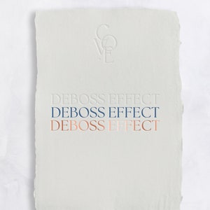 May include: A white card with the text "DEBOSS EFFECT" repeated three times in blue and pink. The text is embossed into the card. The top of the card has a white embossed logo that says "COVE".