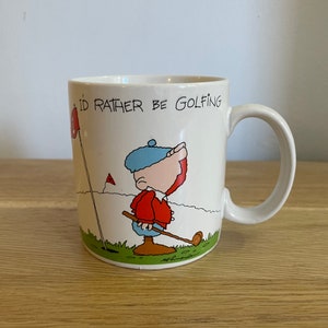 Jag skulle hellre spela golf — vintagemugg av Russ