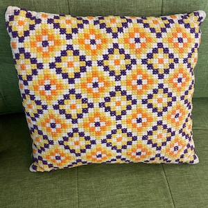Vintage 1970s crewel pillow . Purple fabric backing