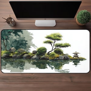 May include: A rectangular mouse pad featuring a watercolor painting of a Japanese garden scene. The design includes a pond, trees, rocks, and a small pagoda. The color palette is dominated by greens, blues, and grays.