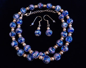 Blue lampworked glass bead and copper necklace and earring set