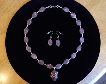 Purple mystery stone necklace with silver toned wire-wrapped pendant and earring set
