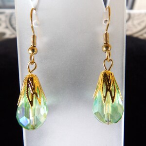 Gold topped green aurora borealis teardrop earrings
