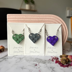 Keychain and necklace store for couples
