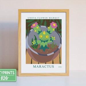 May include: A green and yellow Maractus Pokemon illustration in a brown pot with pink flowers. The illustration is framed with a wooden frame and has the text "UNOVA FLOWER MARKET" and "MARACTUS #556".