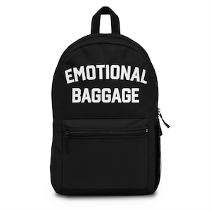 May include: Black backpack with a white text print that says "EMOTIONAL BAGGAGE".