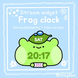 May include: A cute digital clock featuring a frog design. The clock shows the time as 20:17 PM on Saturday. The clock is green with a leaf on its head, set against a light blue background with decorative elements.