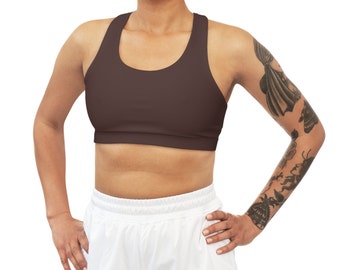 May include: A brown sports bra with a racerback style. The bra is made of a stretchy, comfortable fabric.