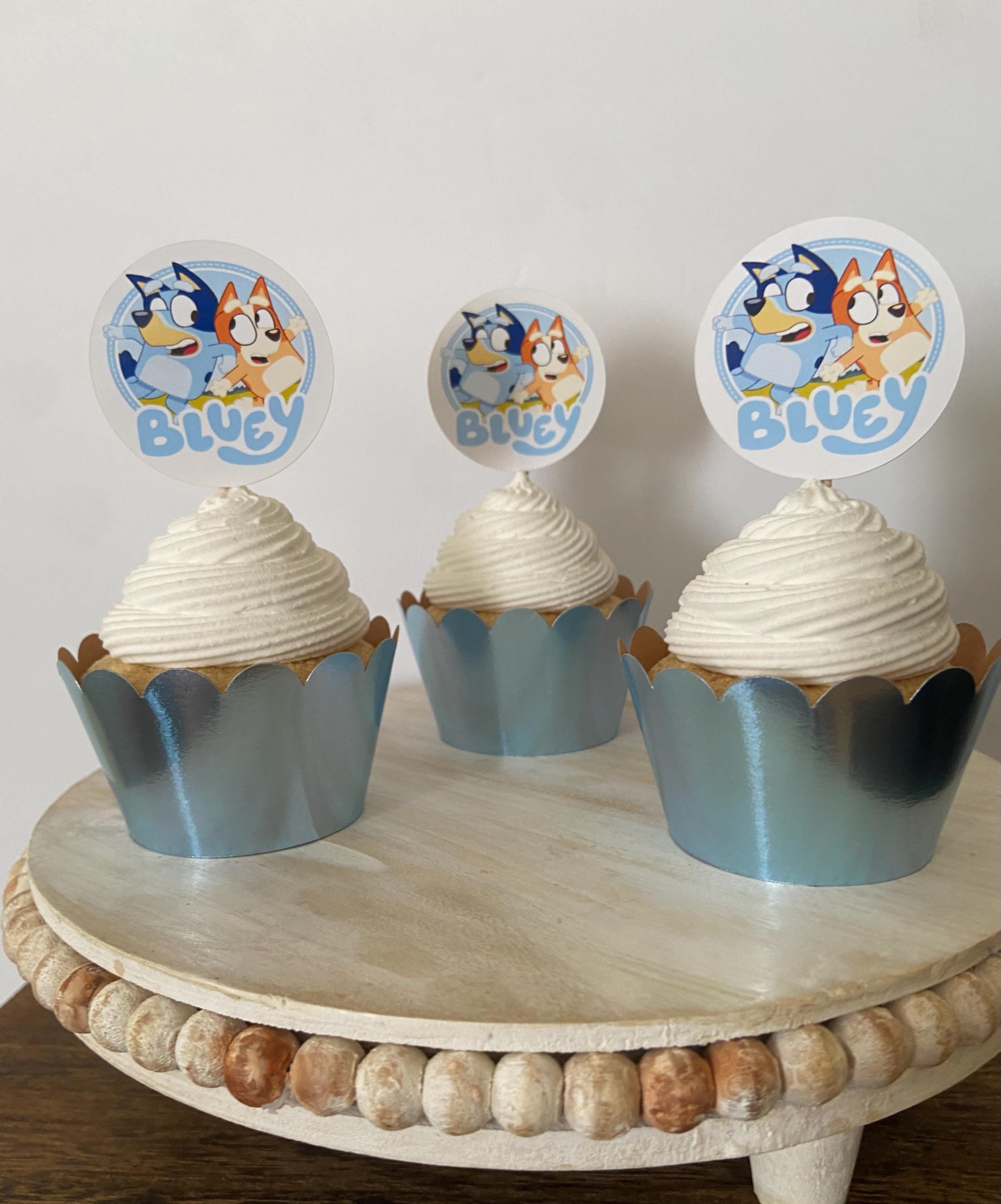 5. Bluey Cupcake toppers and wrappers bundle. Perfect to give your cupcakes a touch for that special occasion. Includes: 12 Bluey Cupcake Toppers , 12 Foil Cardstock Cupcake Wrappers Measurements:Toppers 2