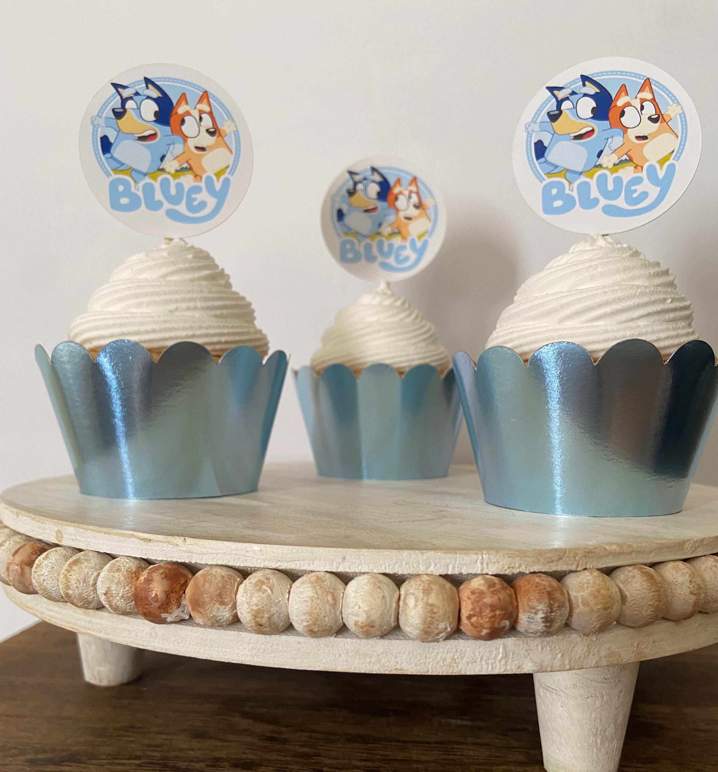 5. Bluey Cupcake toppers and wrappers bundle. Perfect to give your cupcakes a touch for that special occasion. Includes: 12 Bluey Cupcake Toppers , 12 Foil Cardstock Cupcake Wrappers Measurements:Toppers 2