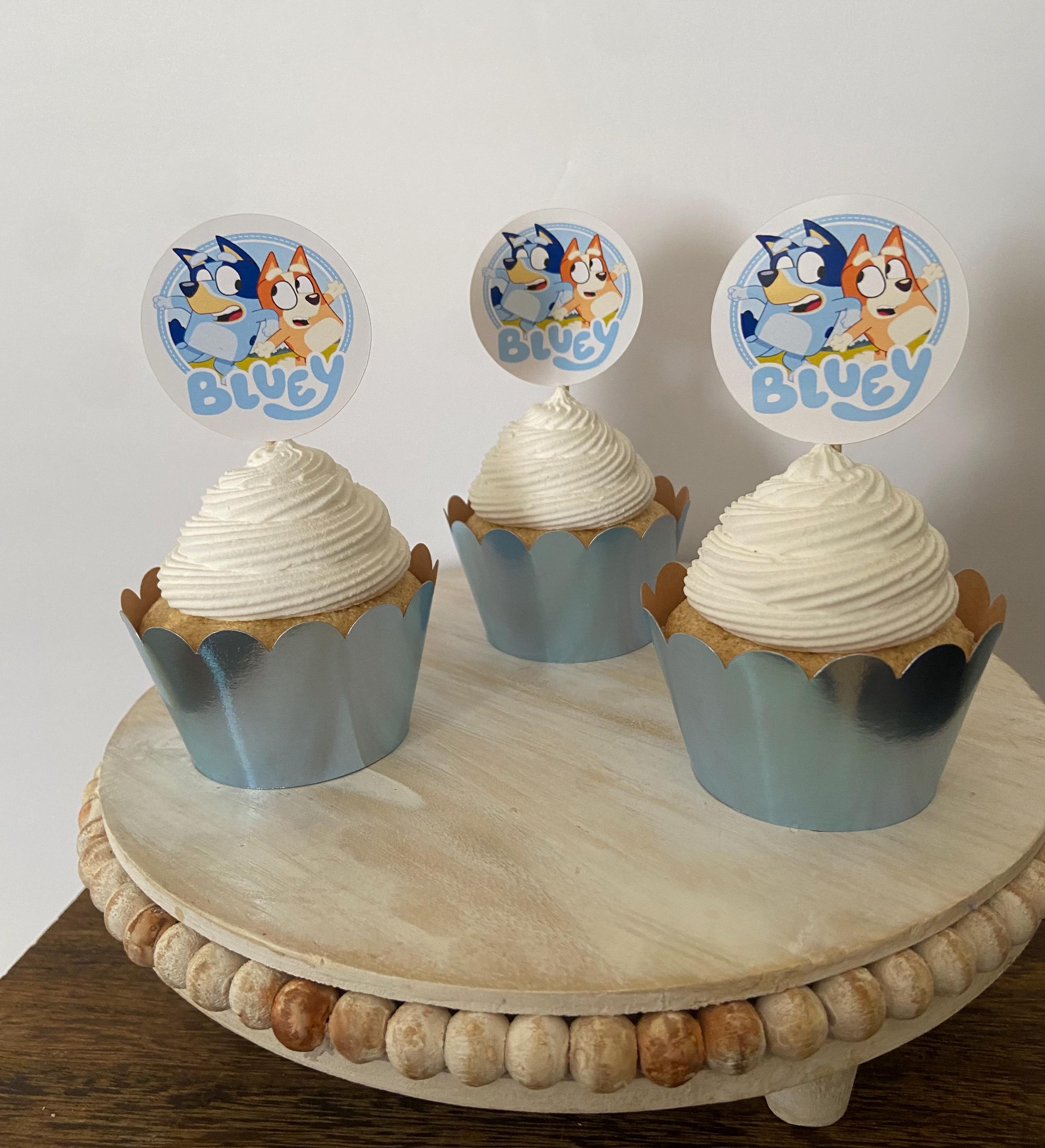 5. Bluey Cupcake toppers and wrappers bundle. Perfect to give your cupcakes a touch for that special occasion. Includes: 12 Bluey Cupcake Toppers , 12 Foil Cardstock Cupcake Wrappers Measurements:Toppers 2